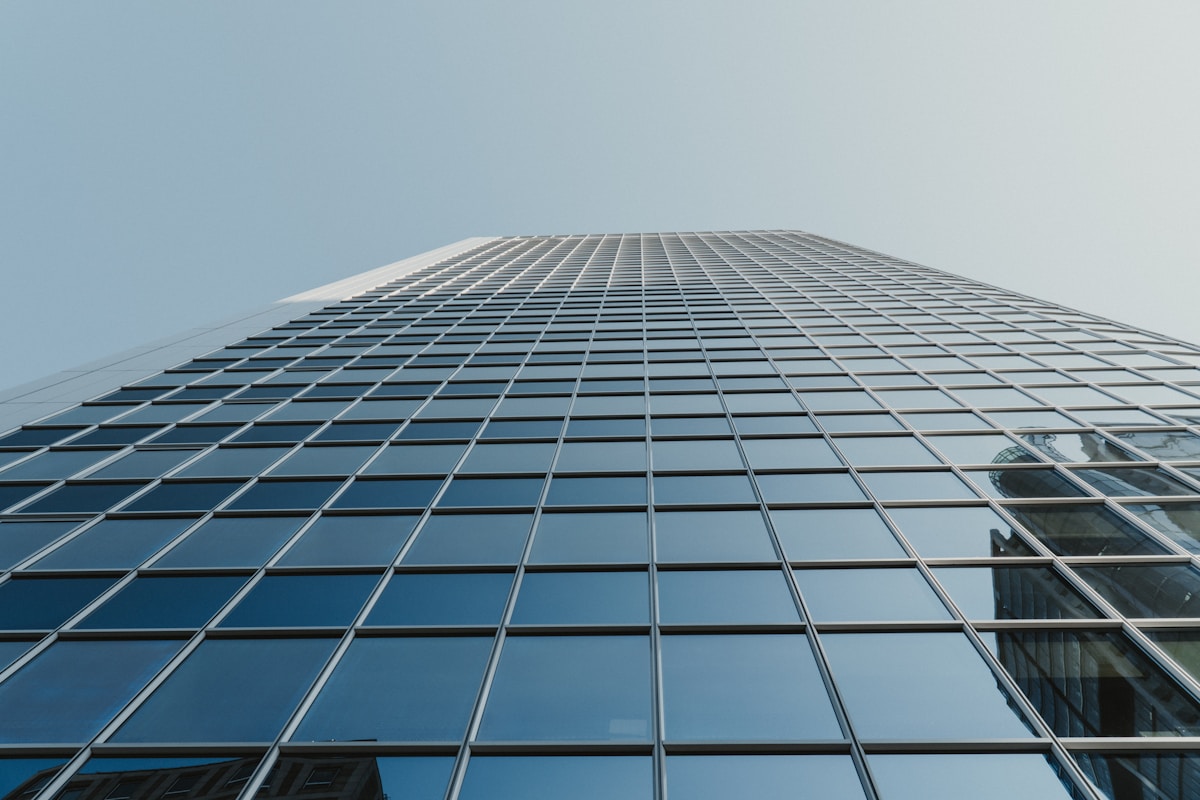Upward view of a contemporary glass building
